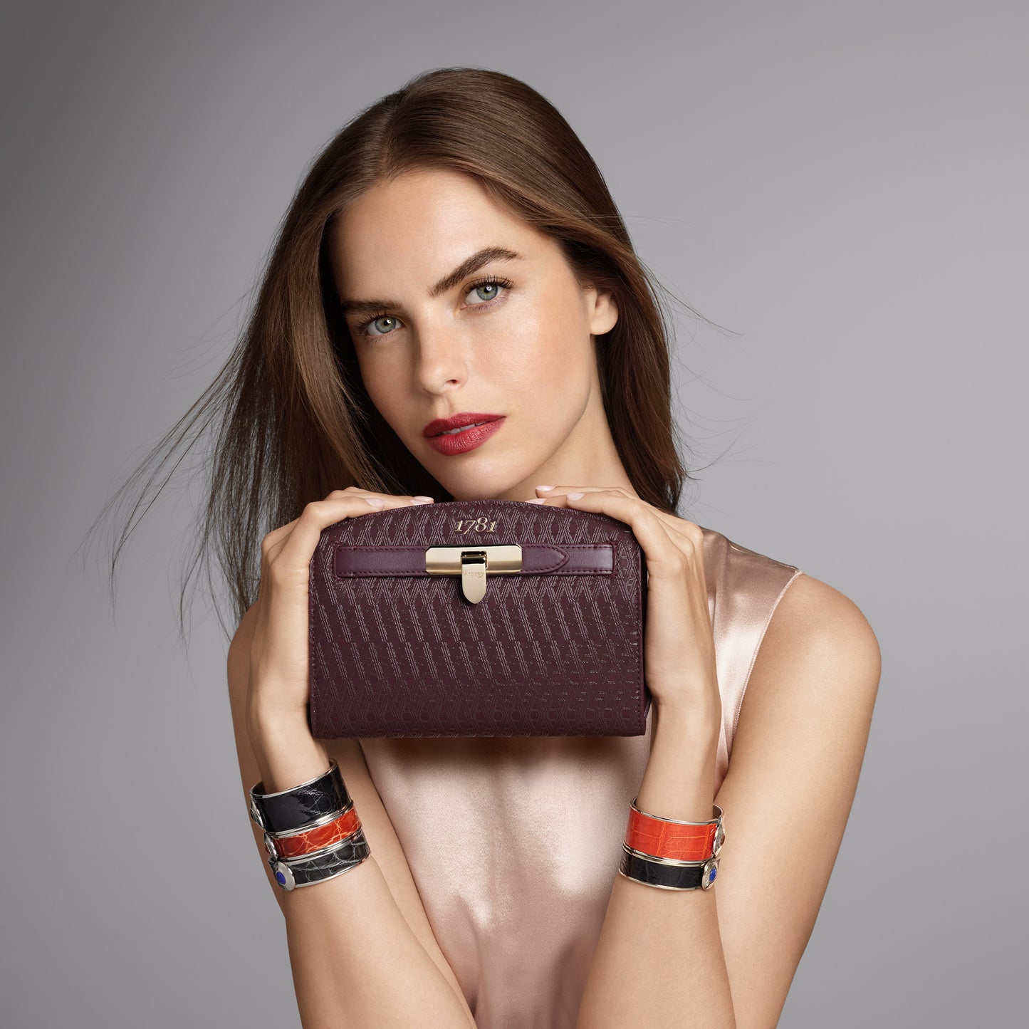 1781 Pochette Handbag in Signature A Patterned Leather